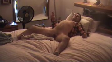 Horny solo stud plays with his toys
