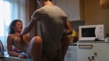 MILF strips down and takes it in the kitchen