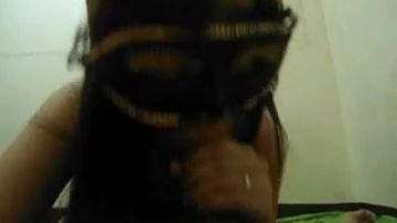 Masked babe sucks POV