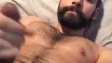 Hairy Arab man stroking on camera